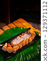 The Crispy Pork on black plate for food concept. 129371112