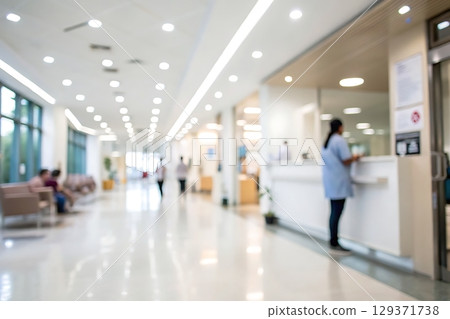 Bright Modern Healthcare Reception Area with Staff and Visitors Engaged in Activities 129371738