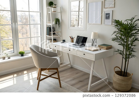 Bright and Modern Home Office with Stylish Desk, Chair, Plants, and Natural Light 129372086