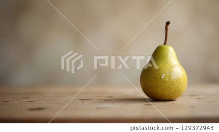 Elegant still life showcasing a ripe yellow pear on a rustic wooden surface perfectly illuminated Elegant still life showcasing a ripe yellow pear on a rustic wooden surface perfectly illuminated 129372943
