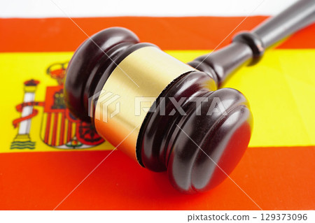 Spain flag with black stethoscope, Business and finance concept. Spain flag with black stethoscope, Business and finance concept. 129373096