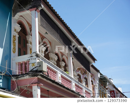 Detailed view of windows, doors and balconies of city buildings Detailed view of windows, doors and balconies of city buildings 129373390