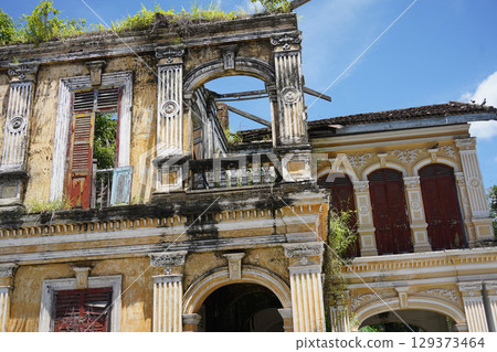 Detailed view of windows, doors and balconies of city buildings Detailed view of windows, doors and balconies of city buildings 129373464