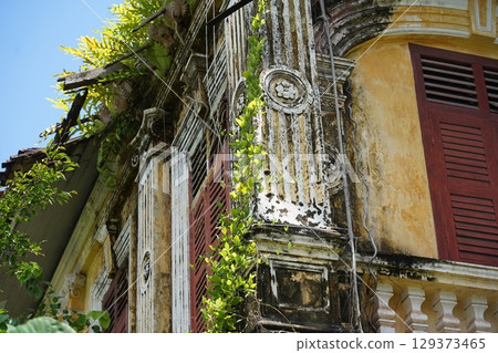 Detailed view of windows, doors and balconies of city buildings Detailed view of windows, doors and balconies of city buildings 129373465
