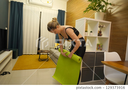 A young woman have a joyfully yoga practice A young woman have a joyfully yoga practice 129373916