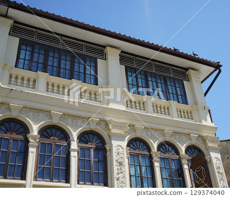 Detailed view of windows, doors and balconies of city buildings Detailed view of windows, doors and balconies of city buildings 129374040