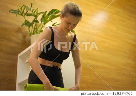 A young woman have a joyfully yoga practice A young woman have a joyfully yoga practice 129374705