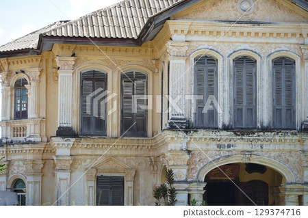 Detailed view of windows, doors and balconies of city buildings Detailed view of windows, doors and balconies of city buildings 129374716