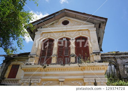 Detailed view of windows, doors and balconies of city buildings Detailed view of windows, doors and balconies of city buildings 129374728