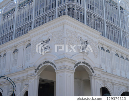 Detailed view of windows, doors and balconies of city buildings  129374813