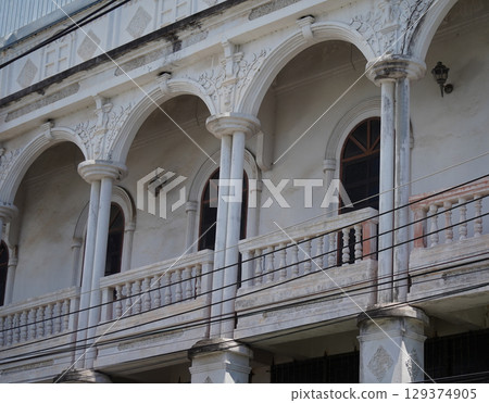 Detailed view of windows, doors and balconies of city buildings Detailed view of windows, doors and balconies of city buildings 129374905