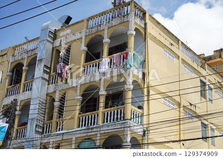 Detailed view of windows, doors and balconies of city buildings Detailed view of windows, doors and balconies of city buildings 129374909