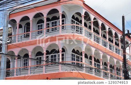 Detailed view of windows, doors and balconies of city buildings Detailed view of windows, doors and balconies of city buildings 129374913