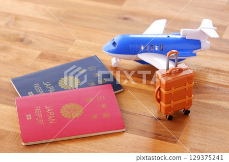 Image of overseas travel with Japanese passports (5-year and 10-year), airplanes, and suitcases Image of overseas travel with Japanese passports (5-year and 10-year), airplanes, and suitcases 129375241