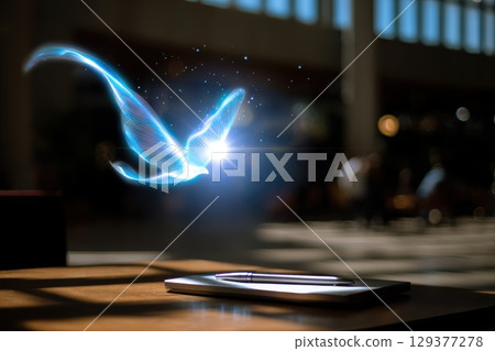 Sunlit Desk with Tablet and Pen, Featuring a Dreamlike Bluebird in a Modern Workspace 129377278
