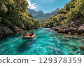 friends on a yellow raft in the emerald blue River with the sun shining and mountains 129378359