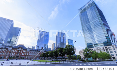 Refreshing blue sky and skyscrapers 129378503