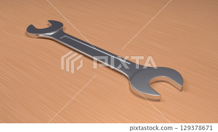 Wrench on a wooden table Wrench on a wooden table 129378671