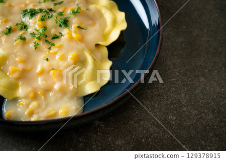 ravioli pasta with corn cheese sauce ravioli pasta with corn cheese sauce 129378915