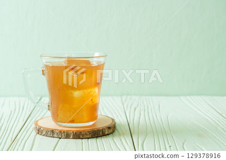 Delicious sweet drink tamarind juice and ice cube Delicious sweet drink tamarind juice and ice cube 129378916