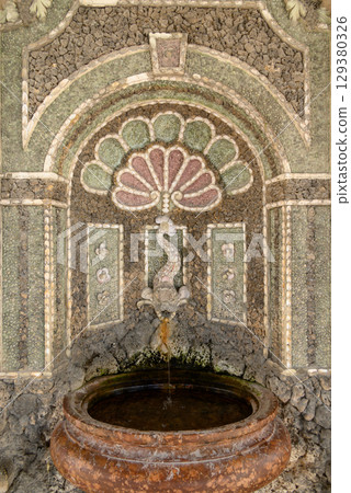 Shell Fountain in the Diana Temple in Hofgarten garden next to the Residenz palace in central Munich, Bavaria, Germany Shell Fountain in the Diana Temple in Hofgarten garden next to the Residenz palace in central Munich, Bavaria, Germany 129380326