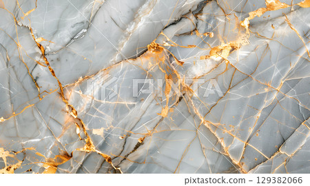Elegant marble texture background with golden veins in a subtle gray and white pattern 129382066