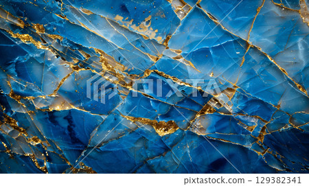 Elegant blue marble texture with gold veins showcasing natural beauty and complexity 129382341