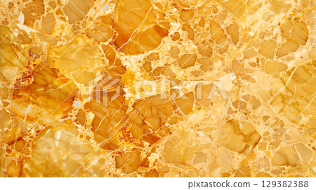 Elegant golden marble texture with intricate veining showcasing natural beauty in modern design 129382388