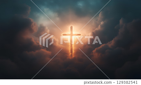 Dramatic cross illuminated against a stormy sky symbolizes resurrection and hope in Christianity 129382541