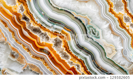 Stunning jasper stone texture showcasing vibrant orange and cream hues with swirling patterns 129382605