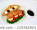 Delicious sandwiches and coffee 129382803