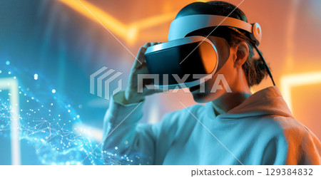 Woman with VR virtual reality goggles Woman with VR virtual reality goggles 129384832