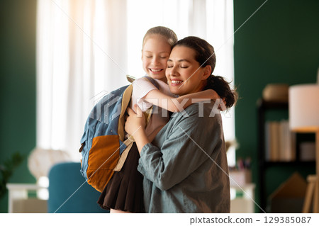 Happy family preparing for school 129385087