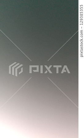 A beautiful blue gradation in the sky 129385355