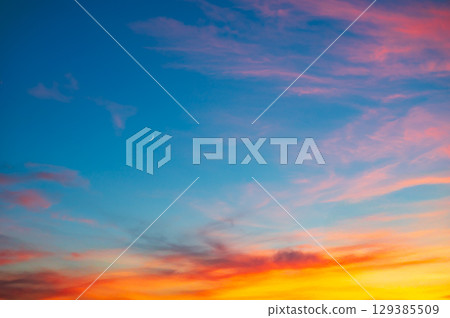 Vivid sunset sky and crescent moon 129385509