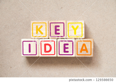 Alphabet letter block in word key idea on wood background 129386650