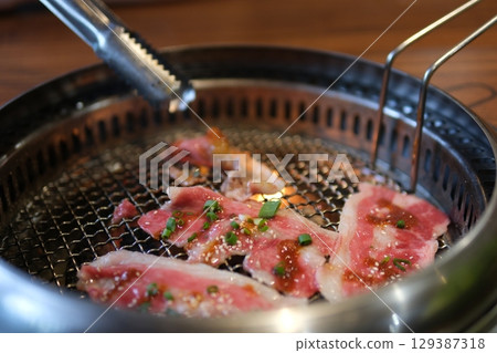 Japanese cuisine:"YAKINIKU" grilled meat on a grill Japanese cuisine:"YAKINIKU" grilled meat on a grill 129387318