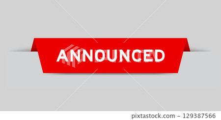 Red color inserted label with word announced on gray background 129387566