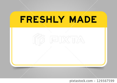 Label banner that have yellow headline with word freshly made and white copy space, on gray background 129387599