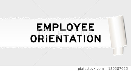 Ripped gray paper background that have word employee orientation under torn part 129387623