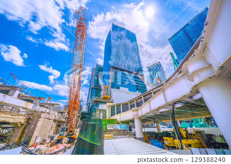 Tokyo cityscape, Japan, August 8th. Extremely hot... Cranes and the redevelopment of Shibuya Station are visible. Towards a new chapter... = Shibuya Tokyo cityscape, Japan, August 8th. Extremely hot... Cranes and the redevelopment of Shibuya Station are visible. Towards a new chapter... = Shibuya 129388240