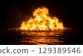 fire flames in the dark night background in the sea 129389546