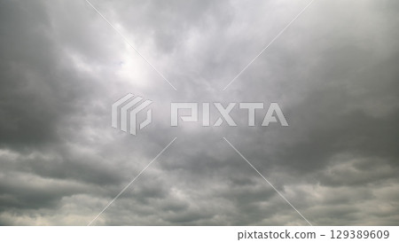 Dramatic Cloudy Skies That Are Full of Energy and Constant Motion for All to Witness 129389609