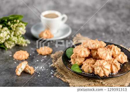 Homemade coconut cookies on a gray background. Healthy food concept. For advertising confectionery products 129391313