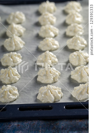 The process of making coconut cookies. Homemade baking The process of making coconut cookies. Homemade baking 129391333