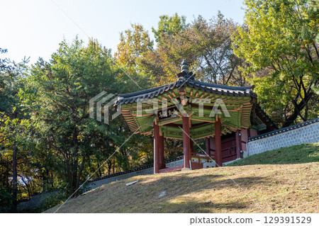 Mirohanjeong Pavilion, a hexagon pavilion on the hill at Suwon Hwaseong Palace, South Korea with autumn landscape. The traditional Chinese text is its name, means a pavilion for relaxing in old age. Mirohanjeong Pavilion, a hexagon pavilion on the hill at Suwon Hwaseong Palace, South Korea with autumn landscape. The traditional Chinese text is its name, means a pavilion for relaxing in old age. 129391529