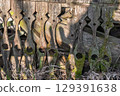 Intricate and Detailed Exploration of Weathered Woodwork Accompanied by Subtle Shadows 129391638