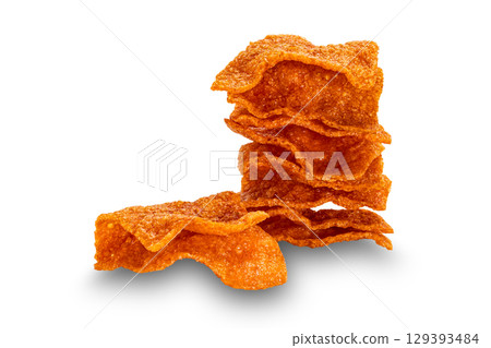 Stack of crispy sweet pork slices isolated on white background. Stack of crispy sweet pork slices isolated on white background. 129393484
