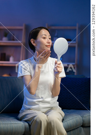 Women who do skin care at night Women who do skin care at night 129394162