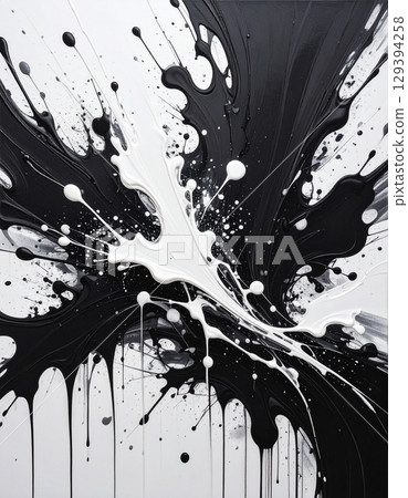 A large canvas is violently splattered and dripped with black and white paint. 129394258